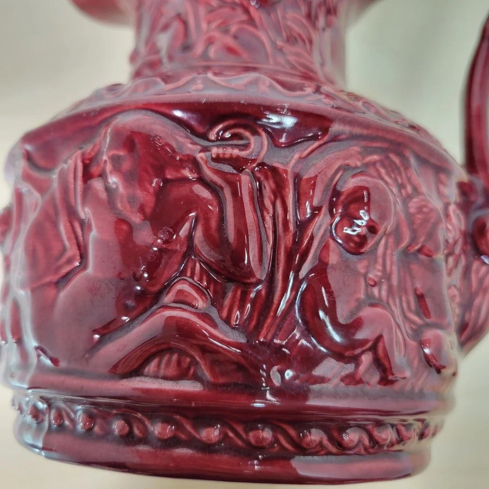 Vintage Burgundy Ceramic Pitcher Jug Relief Figures‎ Embossed Floral Design